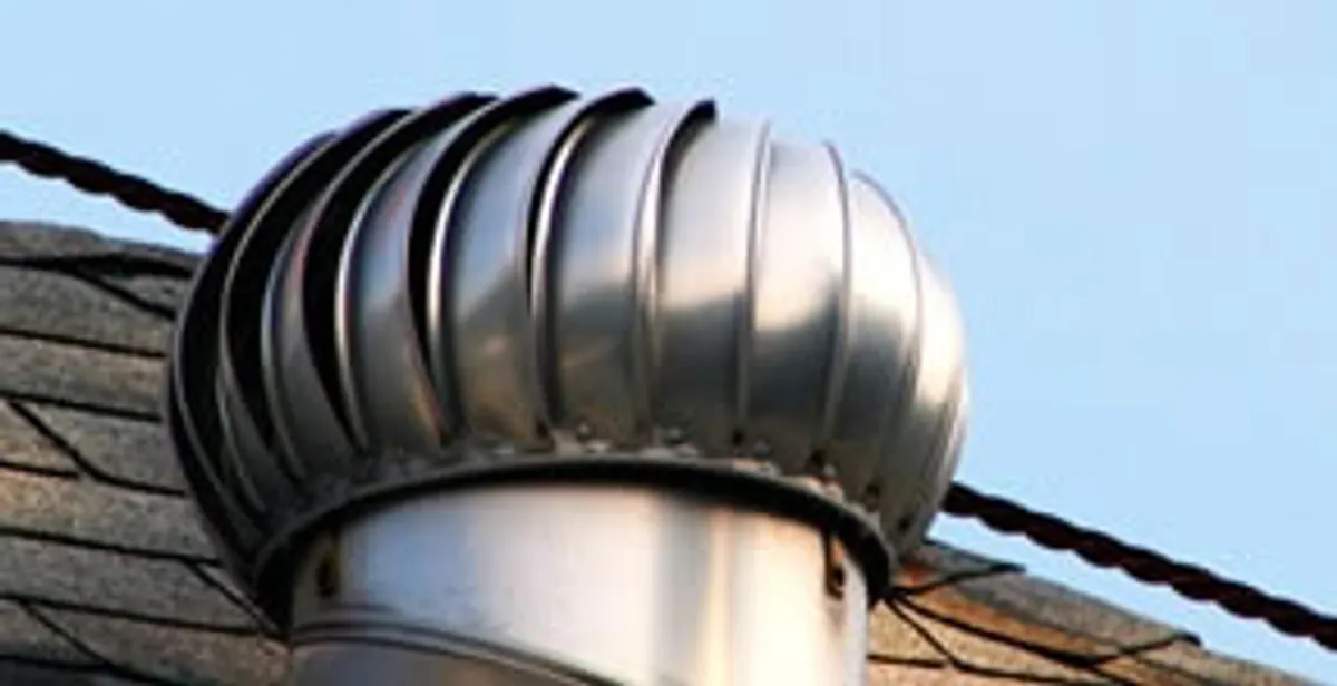 attic fan installation services with professionally installed roof ventilation unit in Chicago, IL