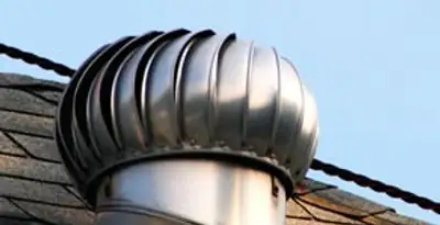 attic fan installation services with professionally installed roof ventilation unit in Chicago, IL