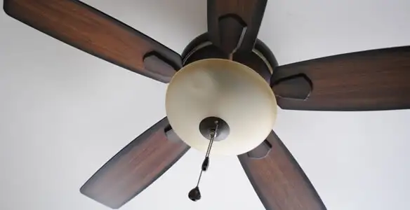 Fully installed ceiling fan with balanced blades and light fixture in Chicago, IL