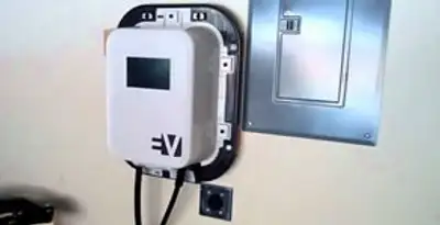 Electric car charger installation with wall-mounted EV charging station in Chicago, IL
