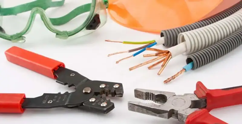 Electrical wiring repair with professional tools and safety equipment in Oak Park, IL