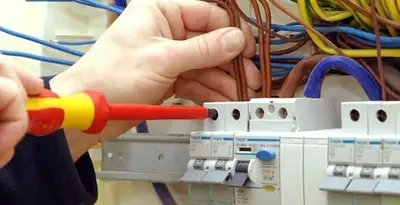 electrician services performing professional electrical panel wiring and connections in Chicago, IL