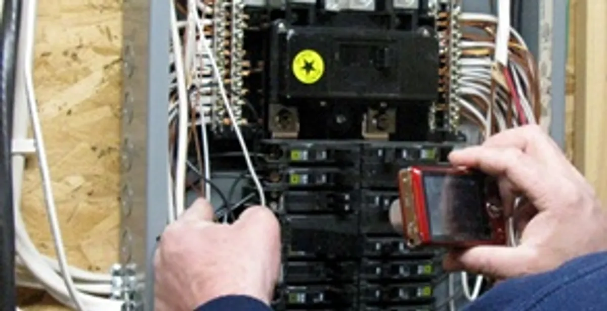 Home electrical inspection of circuit breaker panel by licensed electrician in Chicago, IL