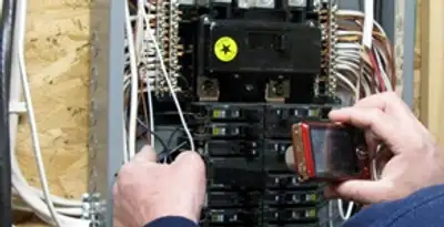 Home electrical inspection of circuit breaker panel by licensed electrician in Chicago, IL