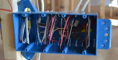 new construction wiring installation featuring electrical boxes and cable routing by expert electricians in Chicago, IL