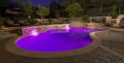 pool light installation and repair services illuminating a residential swimming pool in Chicago, IL