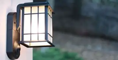 security light installation services with professionally mounted exterior wall light in Chicago, IL