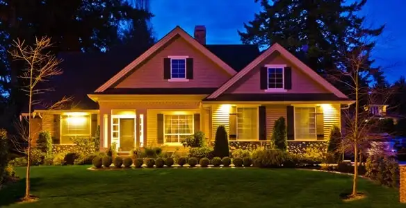 security light installation services illuminating a residential exterior at night in Chicago, IL