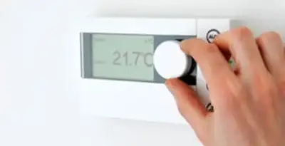 Thermostat installation service with professional adjusting temperature control in Chicago, IL
