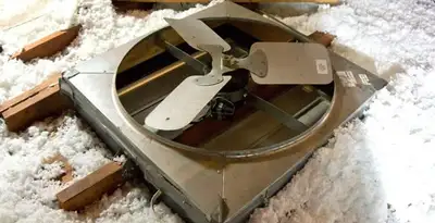 whole house fan installation services with attic-mounted ventilation unit in Chicago, IL
